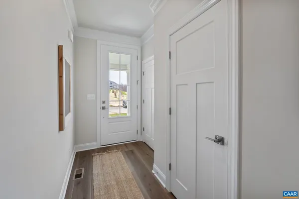 a bathroom with a sink a mirror and a window