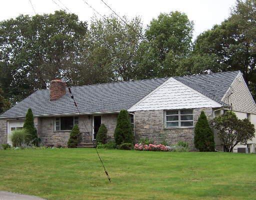 8 West End Road Norwalk, CT 06850 - Photo 1 of 1 a front view of a house with a garden