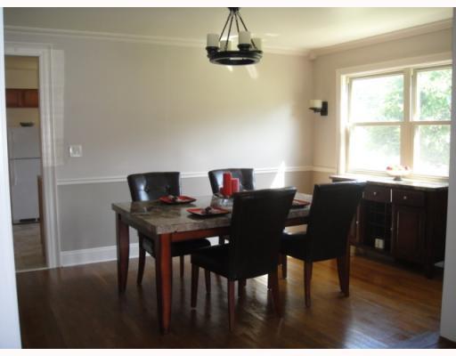 119 Donora Road Monongahela, PA 15063 - Photo 4 of 13 Dining Room. The dining room is rich in detail, with crown moulding, chair rail, new and tasteful lighting + gorgeous hardwood flooring! What a great area to entertain and have family dinners!