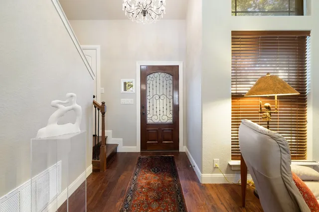 a view of front door with furniture