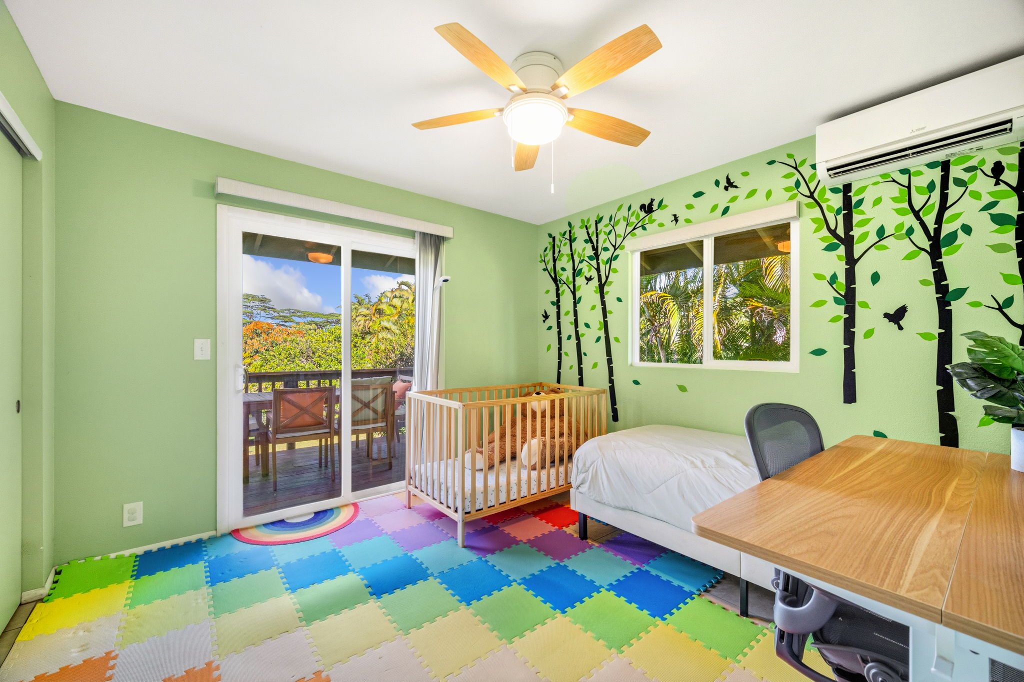 6250 Olohena Road, Unit 2 Kapaa, HI 96746 - Photo 14 of 29 a bedroom with a bed and a window