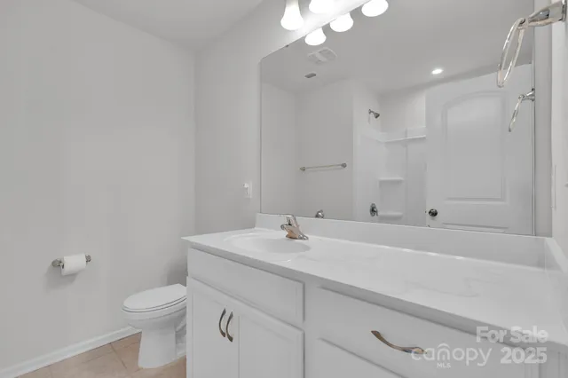 a bathroom with a bathtub and a sink