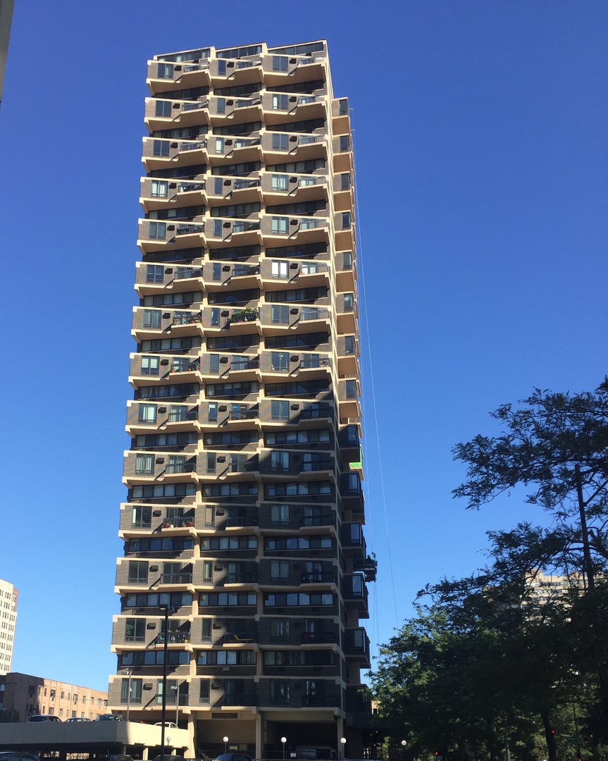 6166 North Sheridan Road, Unit 26J Chicago, IL 60660 - Photo 1 of 1 a front view of a building