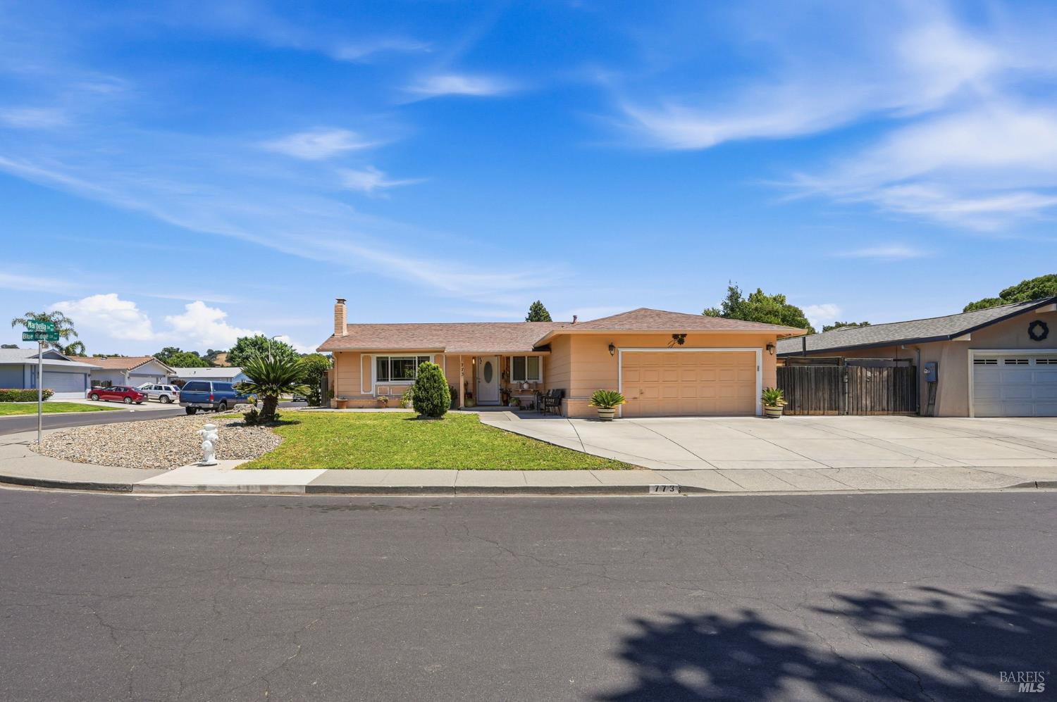 773 Blue Ridge Lane Vacaville, CA 95688 - Photo 2 of 44 a yellow and red house with a yard