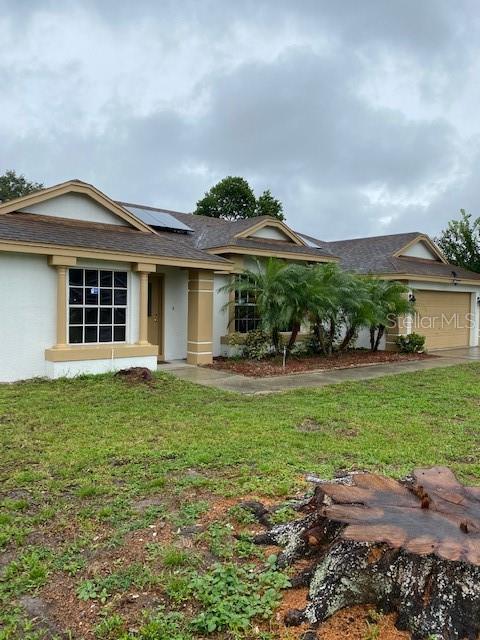 8537 Rose Groves Road Orlando, FL 32818 - Photo 1 of 1 Freshly painted exterior. New solar panels (2021).