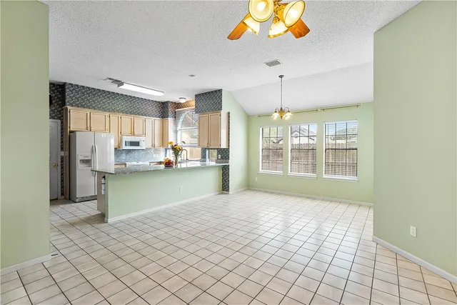 a view of kitchen and window