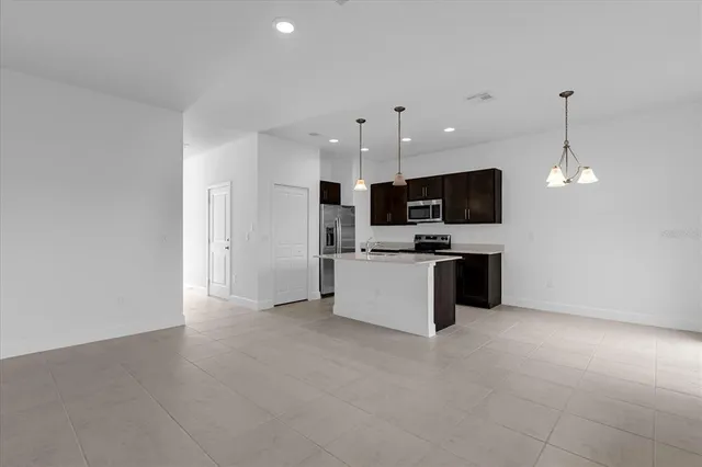 a large kitchen with cabinets