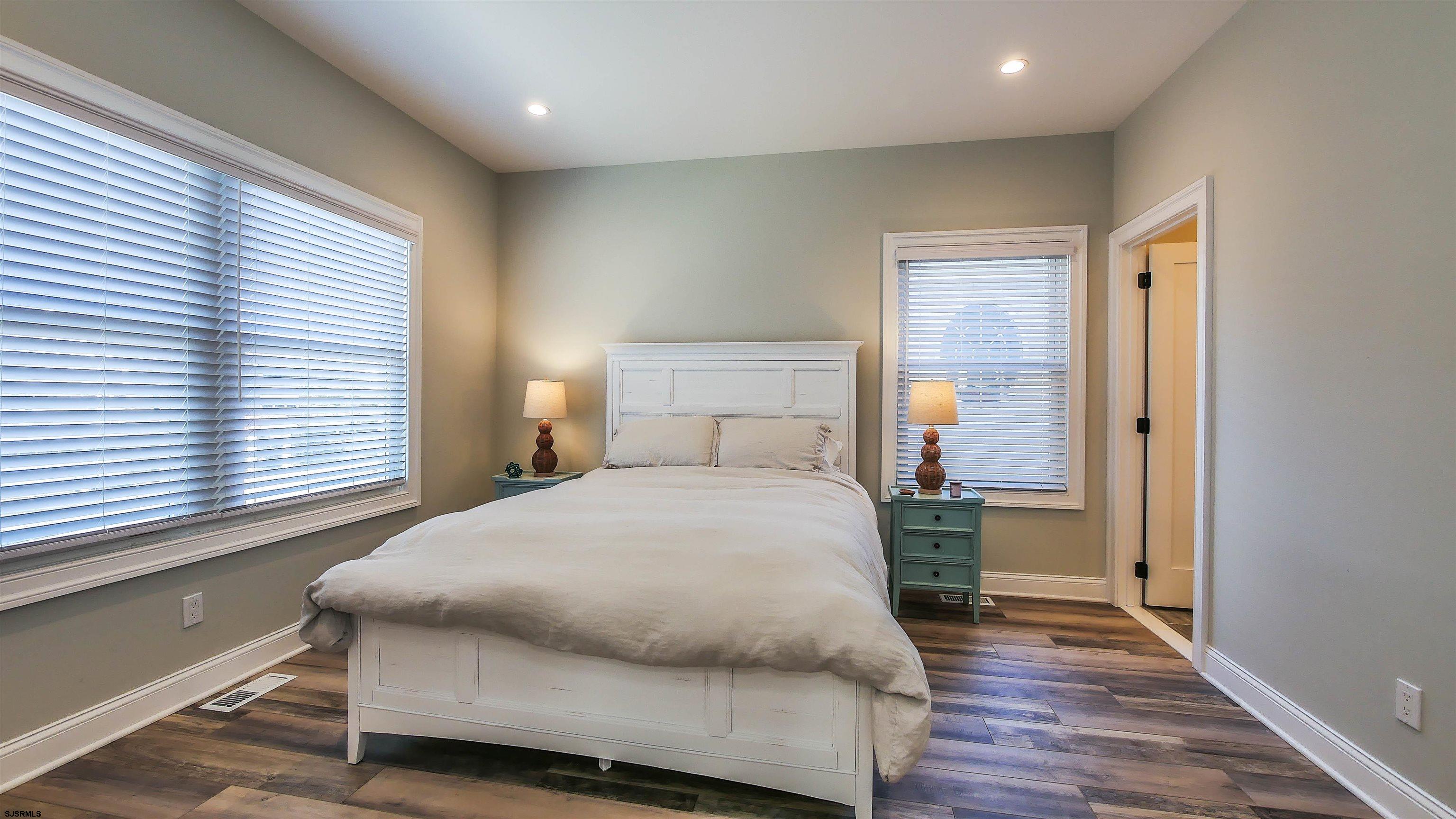 9 Commonwealth Avenue Strathmere, NJ 08248 - Photo 17 of 51 a bedroom with a bed and window