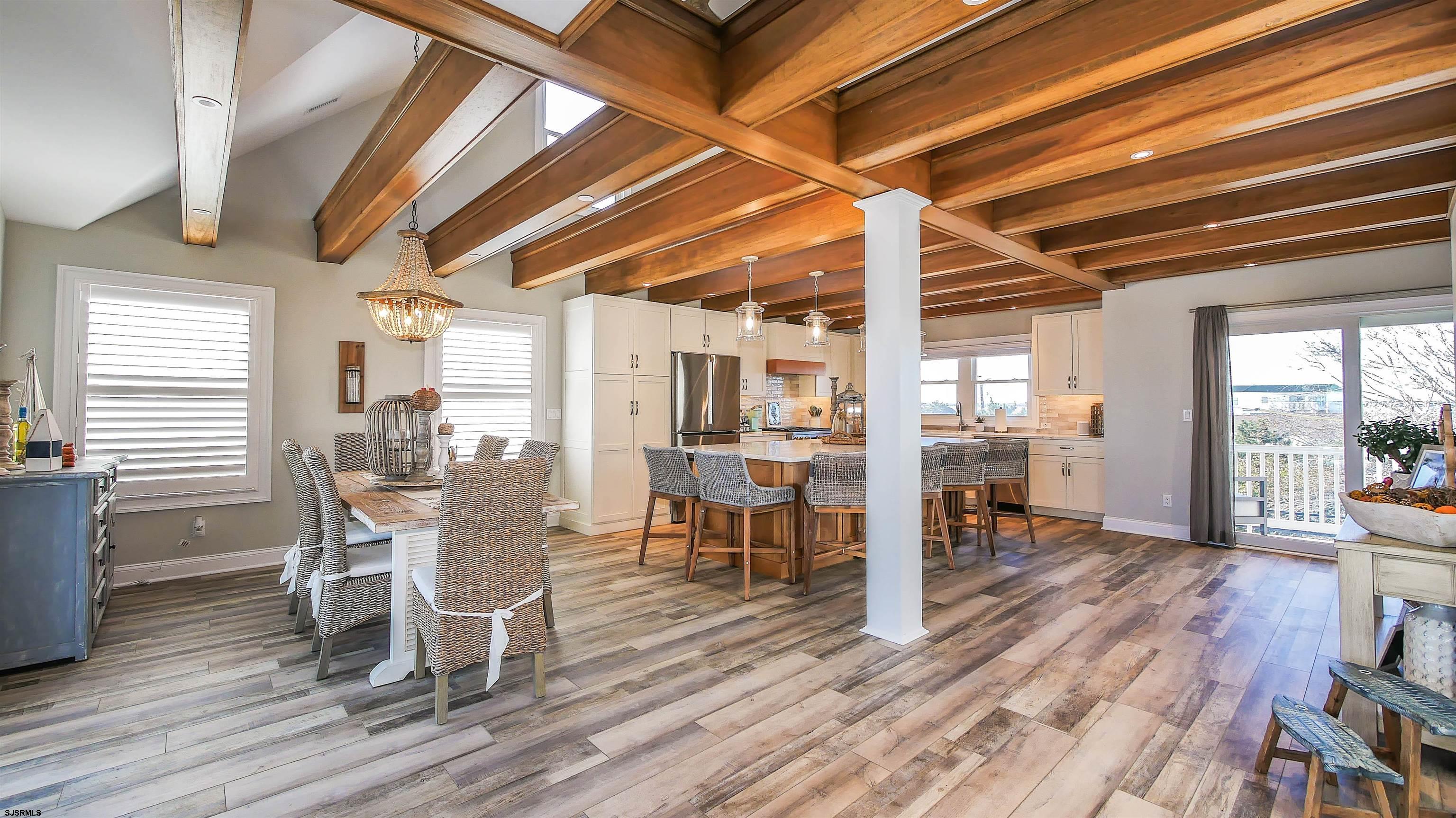 9 Commonwealth Avenue Strathmere, NJ 08248 - Photo 22 of 51 a view of a dining room with furniture and wooden floor