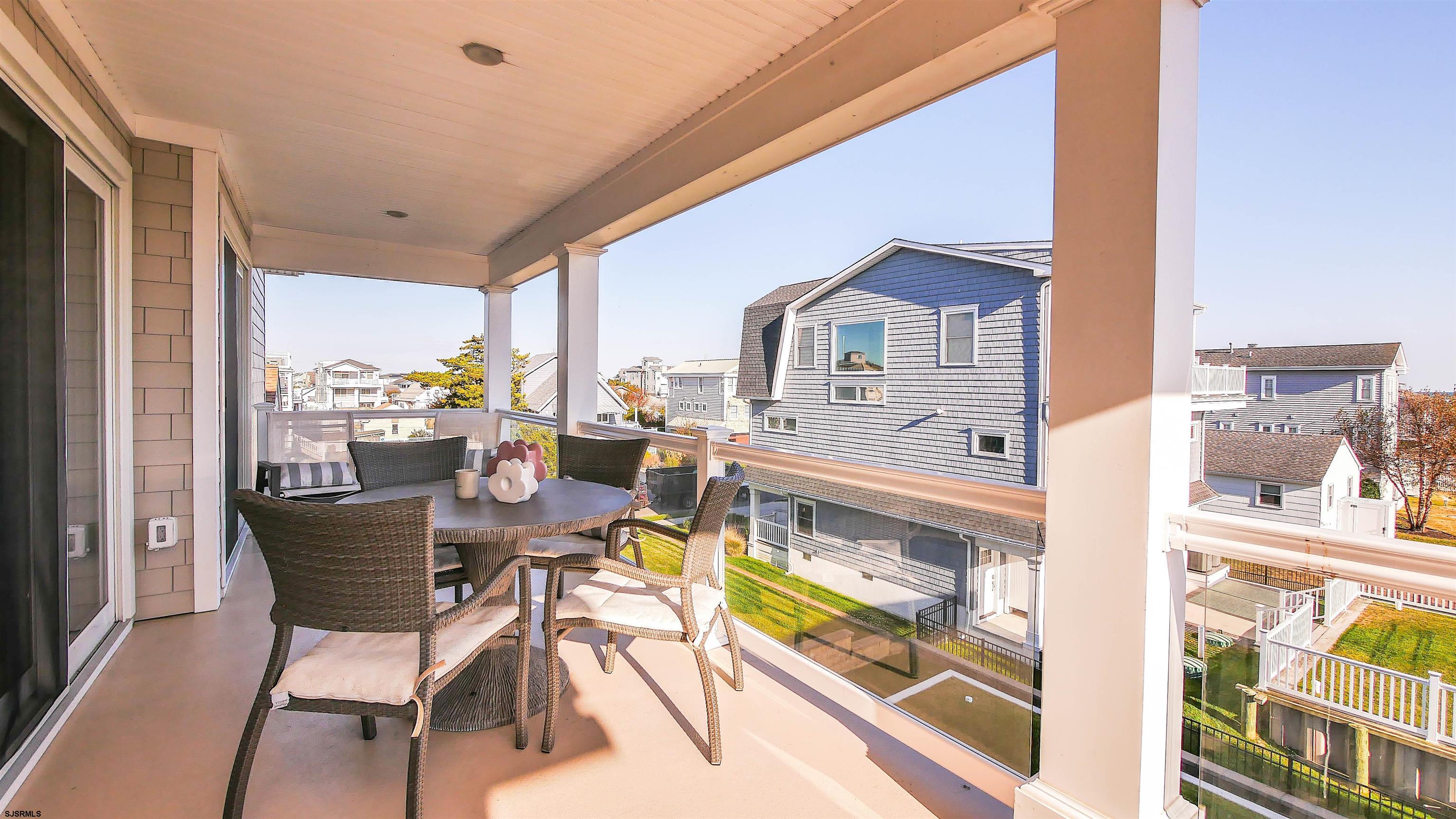 9 Commonwealth Avenue Strathmere, NJ 08248 - Photo 32 of 51 a view of a dining room with furniture window and outside view