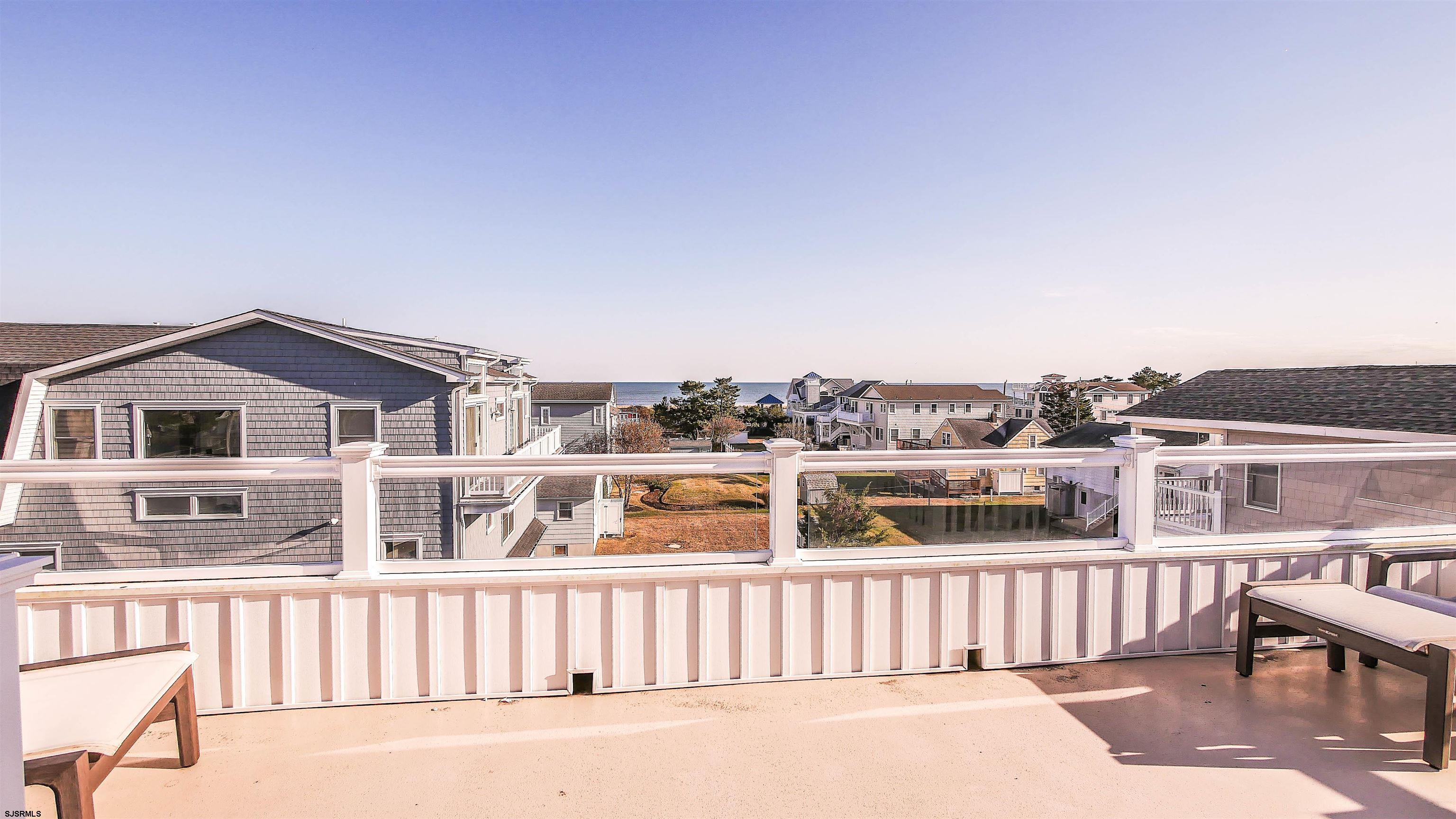 9 Commonwealth Avenue Strathmere, NJ 08248 - Photo 40 of 51 a view of a large white building