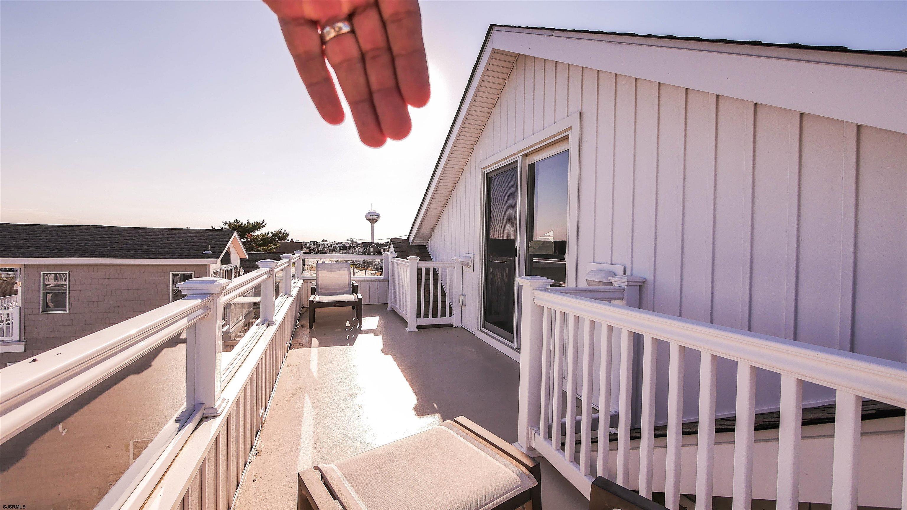 9 Commonwealth Avenue Strathmere, NJ 08248 - Photo 42 of 51 a view of balcony and deck
