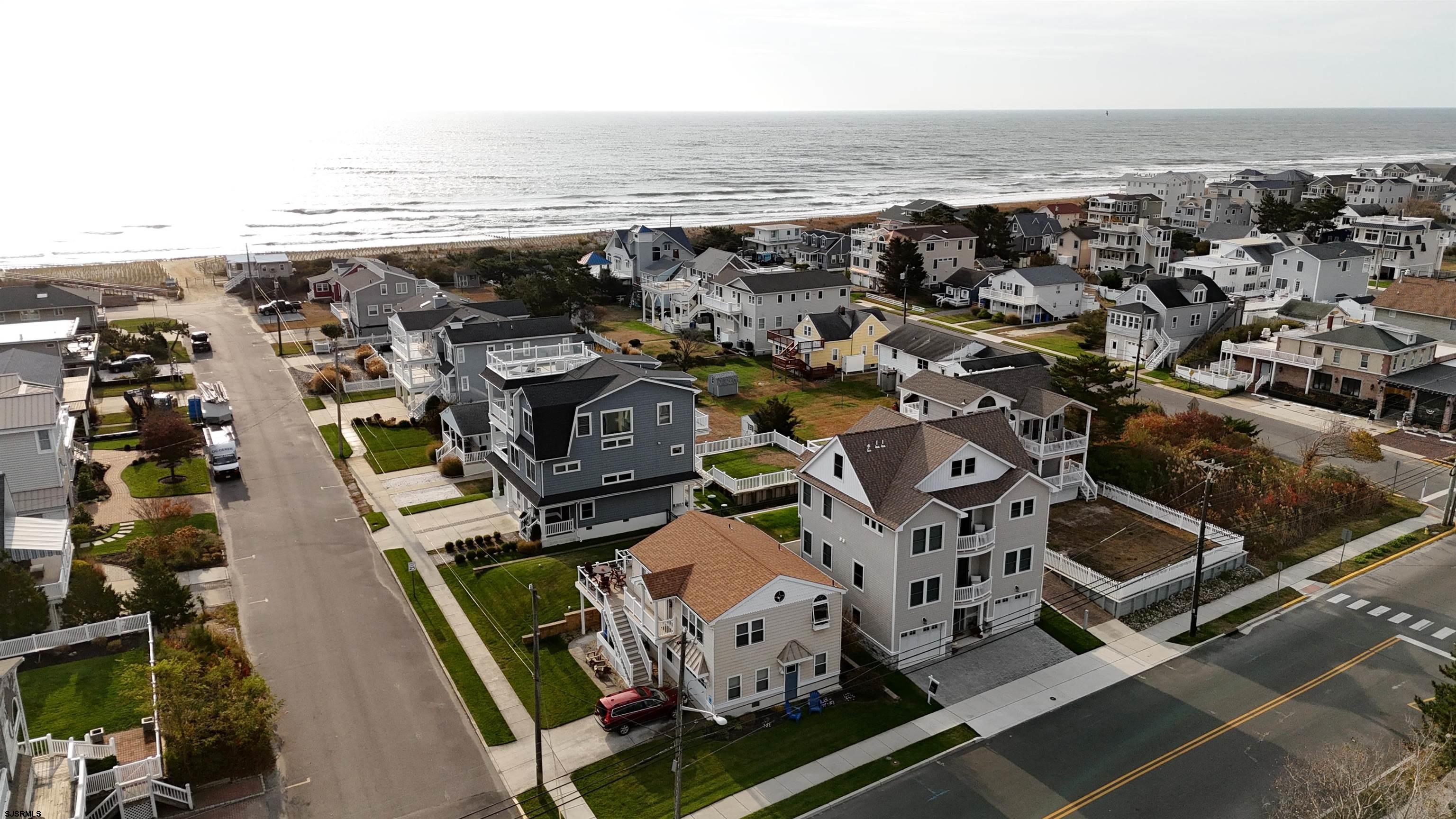9 Commonwealth Avenue Strathmere, NJ 08248 - Photo 49 of 51 an aerial view of residential houses with outdoor space