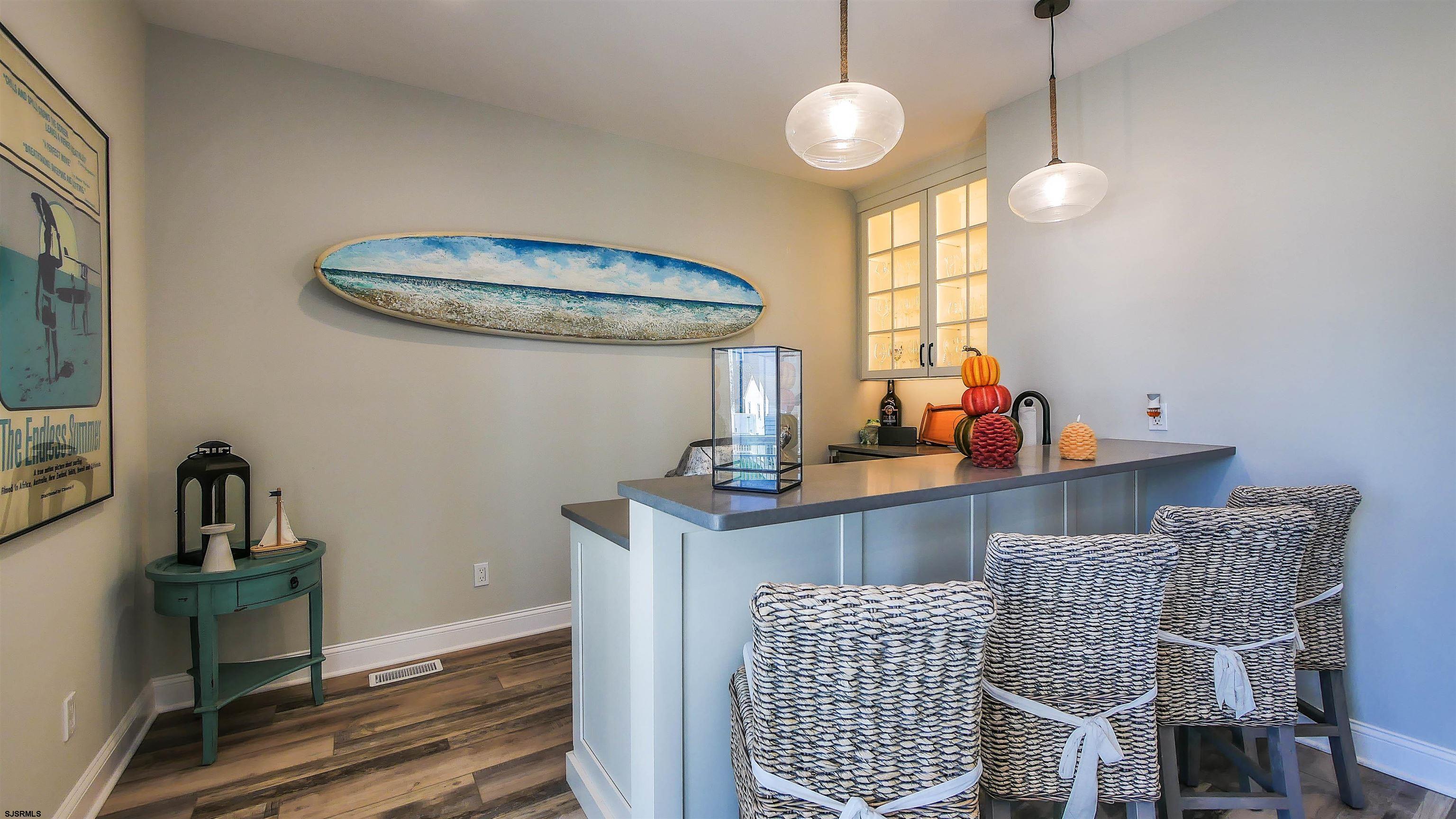9 Commonwealth Avenue Strathmere, NJ 08248 - Photo 9 of 51 a view of a dining room with furniture