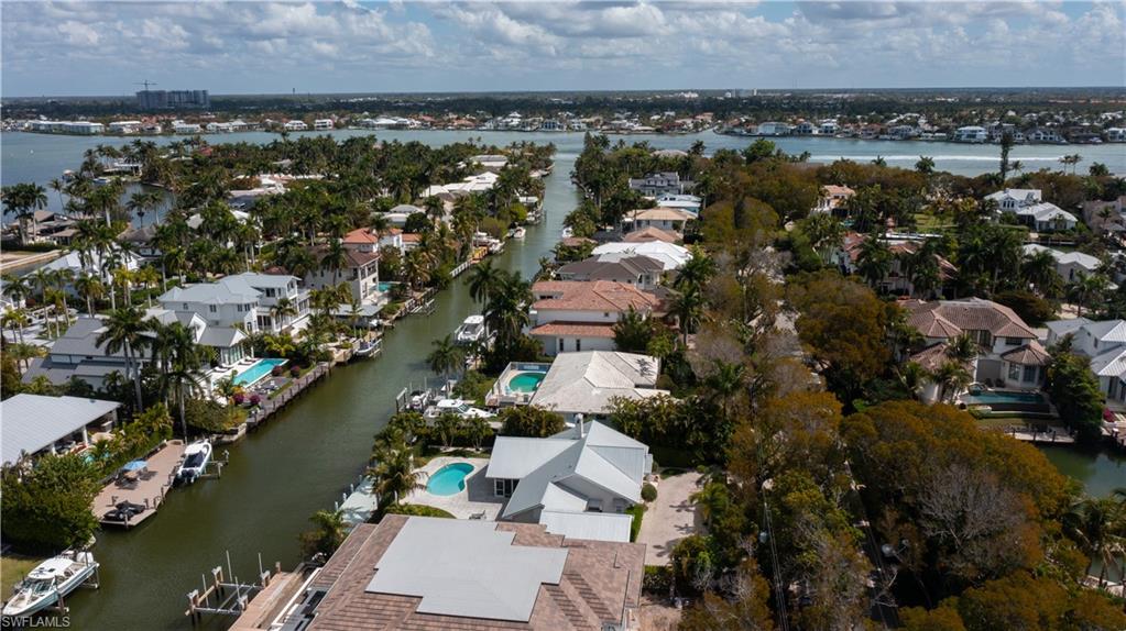 675 18th Avenue South Naples, FL 34102 - Photo 13 of 34 an aerial view of a city with lots of residential buildings