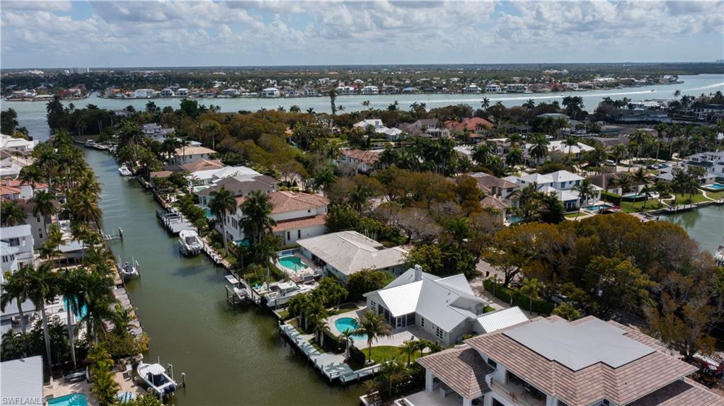 675 18th Avenue South Naples, FL 34102 - Photo 14 of 34 an aerial view of a city with lake view