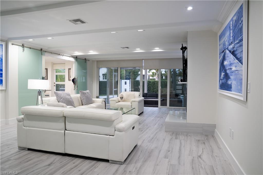 675 18th Avenue South Naples, FL 34102 - Photo 22 of 34 a living room with furniture