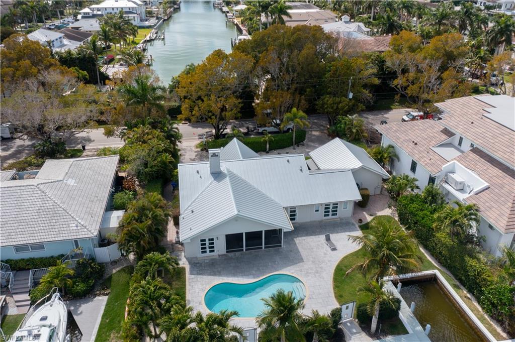 675 18th Avenue South Naples, FL 34102 - Photo 7 of 34 an aerial view of residential houses with outdoor space