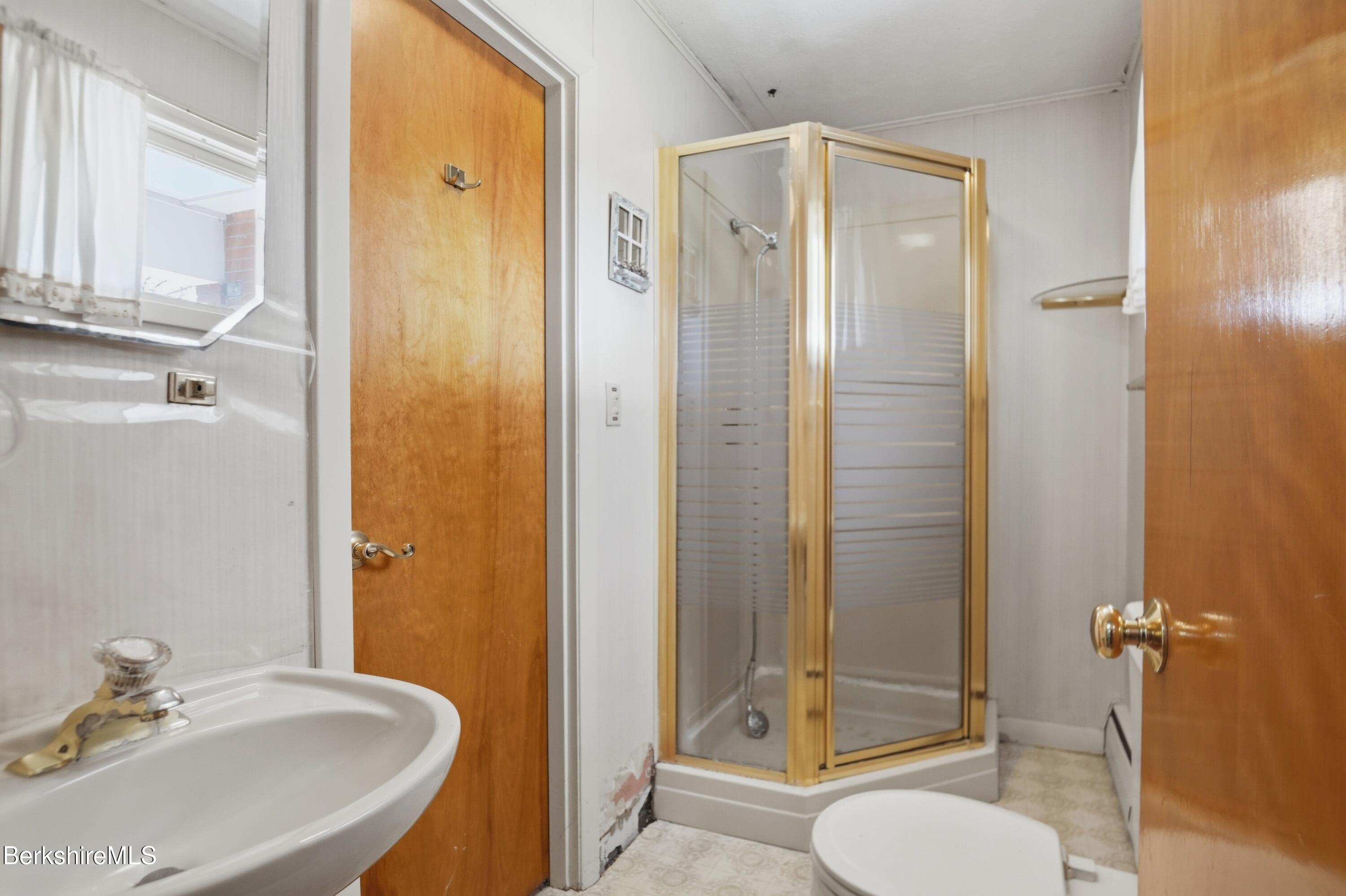 55 Tower Road Dalton, MA 01226 - Photo 24 of 47 a bathroom with a sink toilet and shower