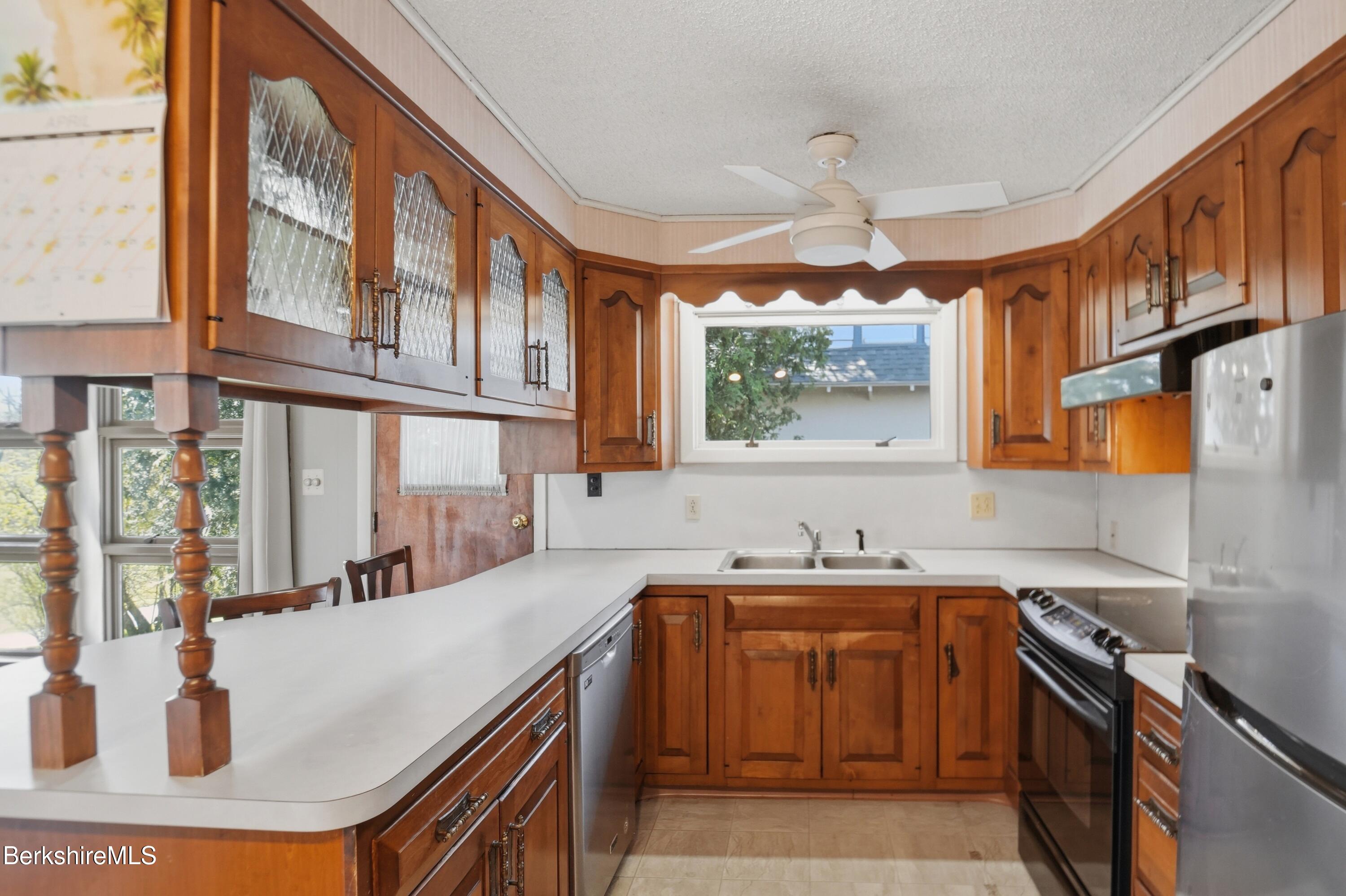 55 Tower Road Dalton, MA 01226 - Photo 3 of 47 a kitchen that has a sink and a stove