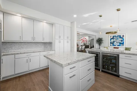 a view of an house with backyard space and garden