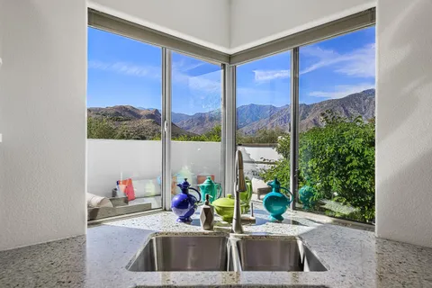 a view of a patio with swimming pool