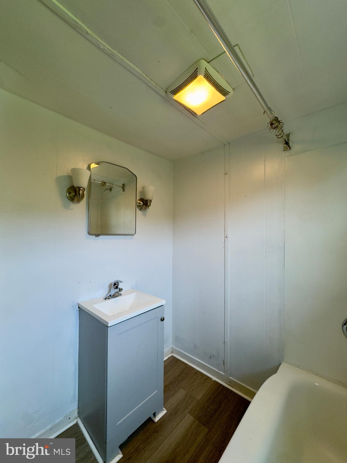 113 Rigdon Road, Unit 2 Aberdeen, MD 21001 - Photo 6 of 10 a bathroom with a sink and a mirror