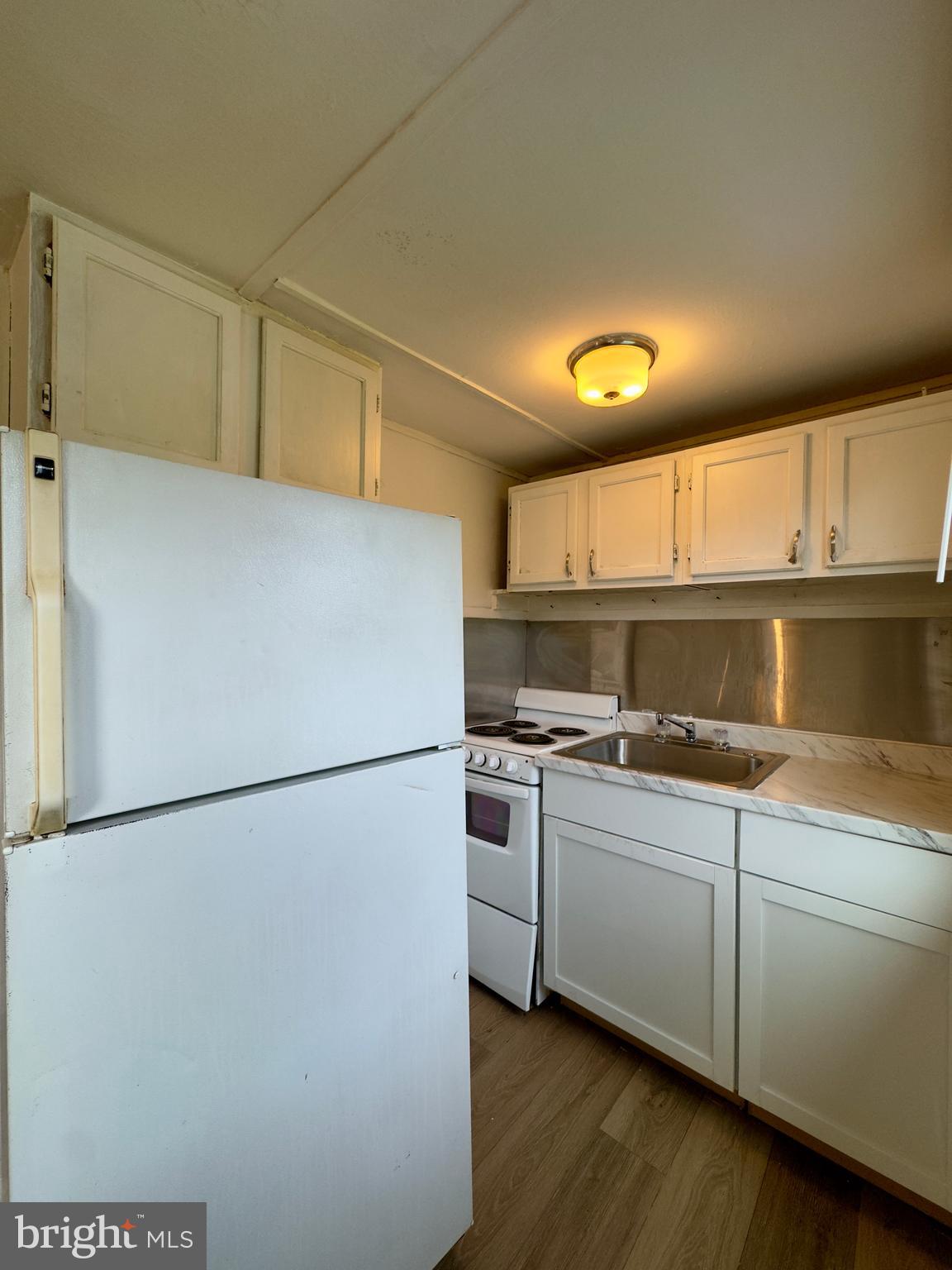 113 Rigdon Road, Unit 2 Aberdeen, MD 21001 - Photo 10 of 10 a kitchen with stainless steel appliances a refrigerator and a sink