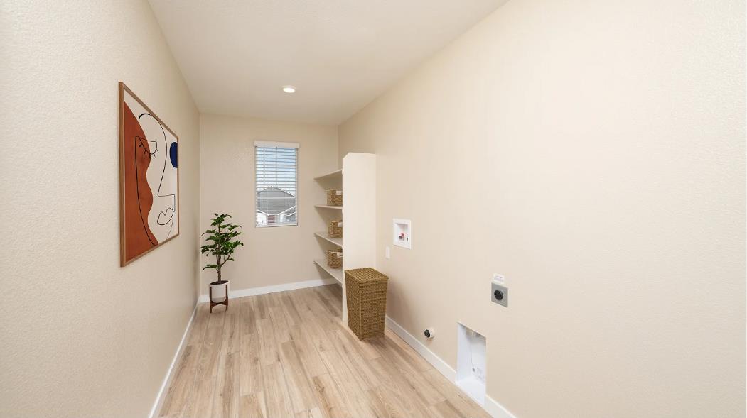 1156 Monique Street Galt, CA 95632 - Photo 5 of 17 a view of a living room with furniture and wooden floor