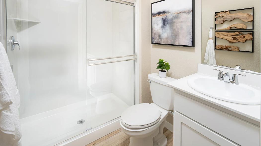 1156 Monique Street Galt, CA 95632 - Photo 8 of 17 a bathroom with a sink a toilet and a bathtub