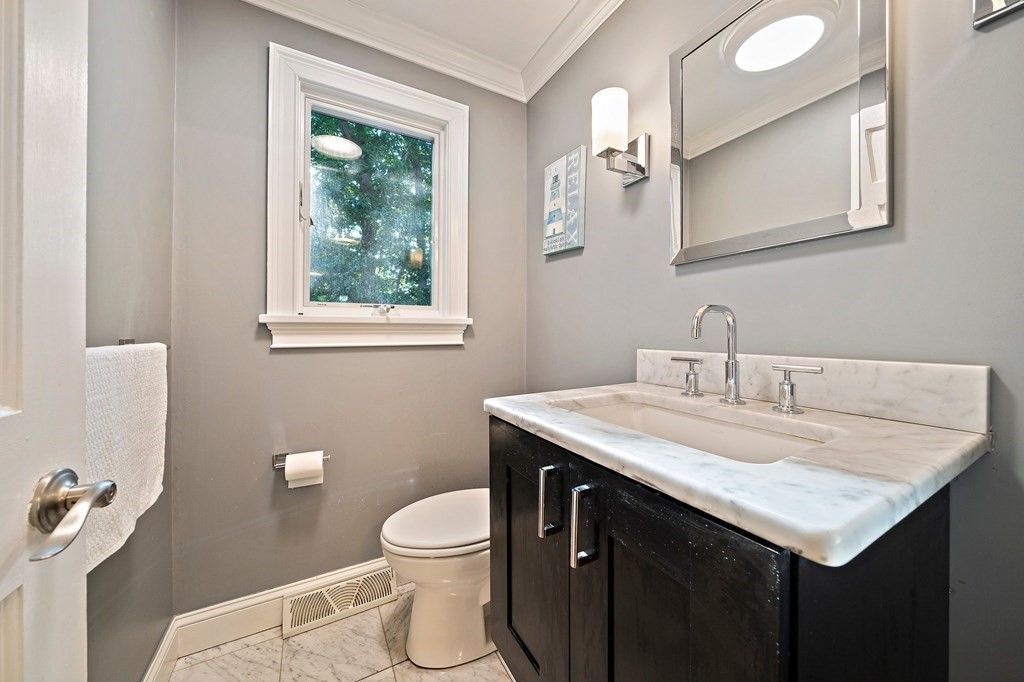 22 Fairview Road Canton, MA 02021 - Photo 13 of 42 a bathroom with a granite countertop sink toilet and mirror