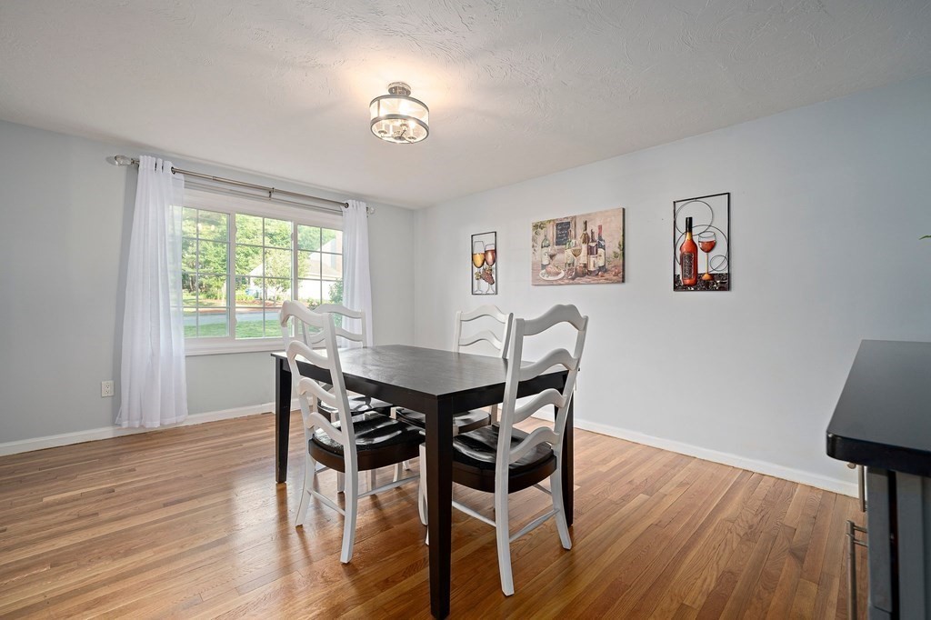 22 Fairview Road Canton, MA 02021 - Photo 21 of 42 a view of a dining room with furniture window and wooden floor