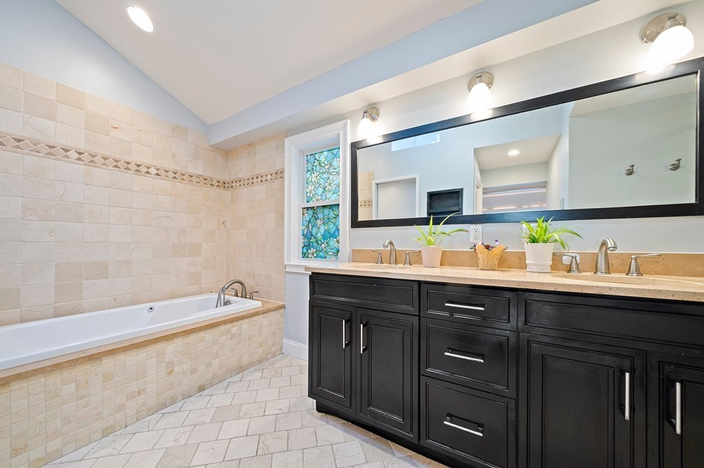 22 Fairview Road Canton, MA 02021 - Photo 25 of 42 a bathroom with a double vanity sink mirror double and bathtub