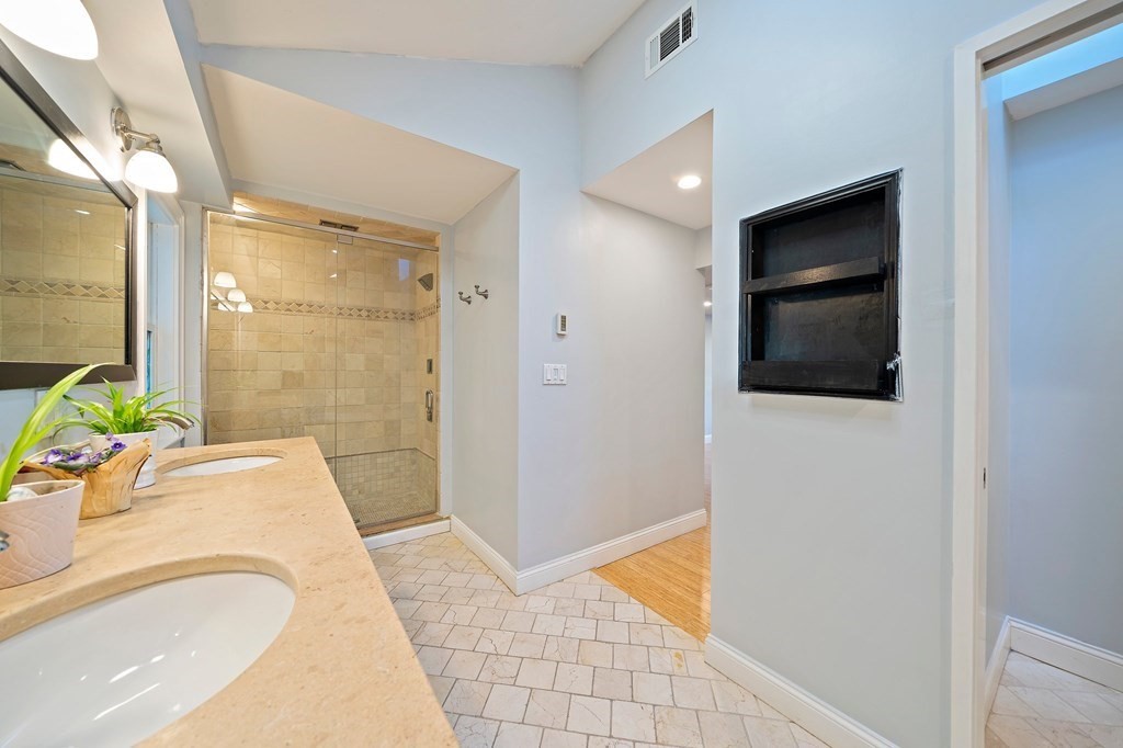 22 Fairview Road Canton, MA 02021 - Photo 26 of 42 a bathroom with a tub and shower