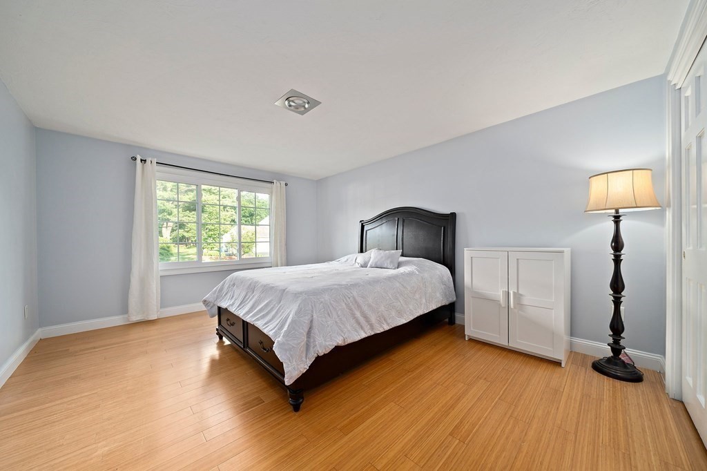 22 Fairview Road Canton, MA 02021 - Photo 27 of 42 a bedroom with a bed and a window