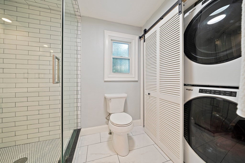 22 Fairview Road Canton, MA 02021 - Photo 32 of 42 a bathroom with a toilet a sink and mirror