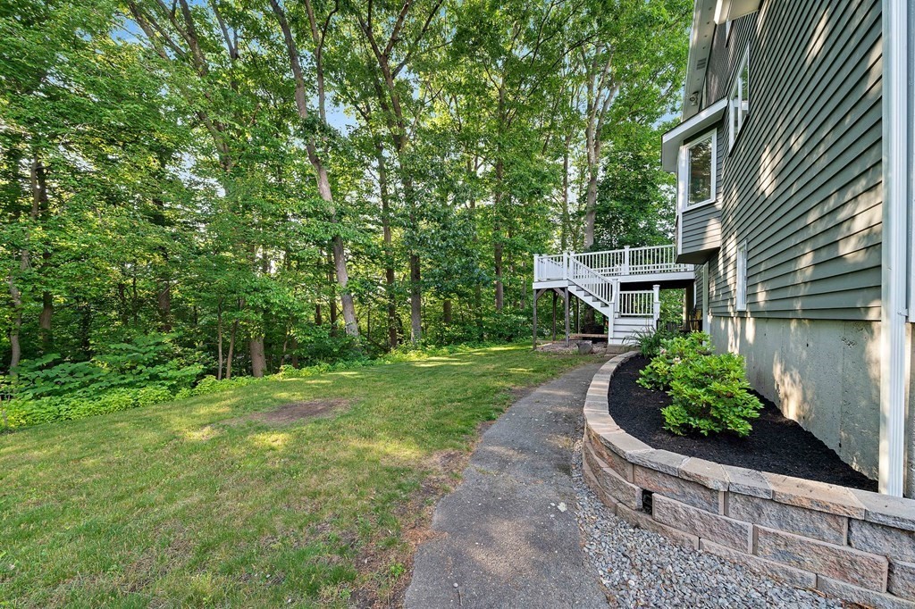 22 Fairview Road Canton, MA 02021 - Photo 37 of 42 a front view of a house with a yard