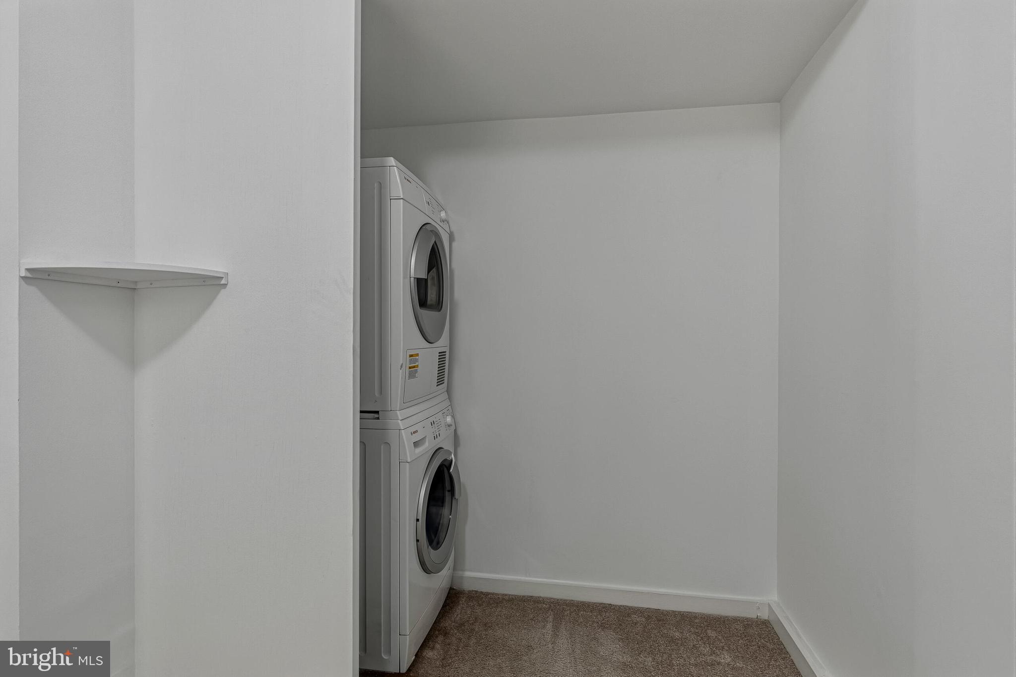 2501 M Street Northwest, Unit 722 Washington, DC 20037 - Photo 16 of 26 Laundry - Upper Level - Primary Suite