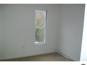 5933 Bluebonnet Road Charlotte, NC 28212 - Photo 11 of 13 a view of an empty room with a window