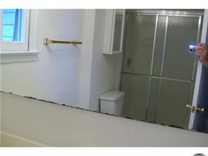 5933 Bluebonnet Road Charlotte, NC 28212 - Photo 13 of 13 a bathroom with a shower and a toilet