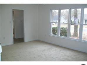 5933 Bluebonnet Road Charlotte, NC 28212 - Photo 4 of 13 a view of an empty room with a window