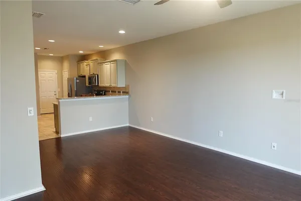 a view of kitchen with wooden floor