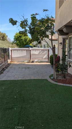 a view of swimming pool with outdoor seating