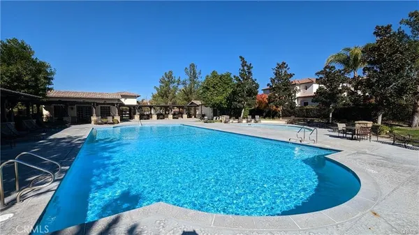 a view of a chairs and tables in patio