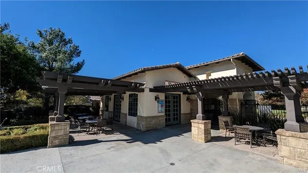 a street view with couple of cars parked on road