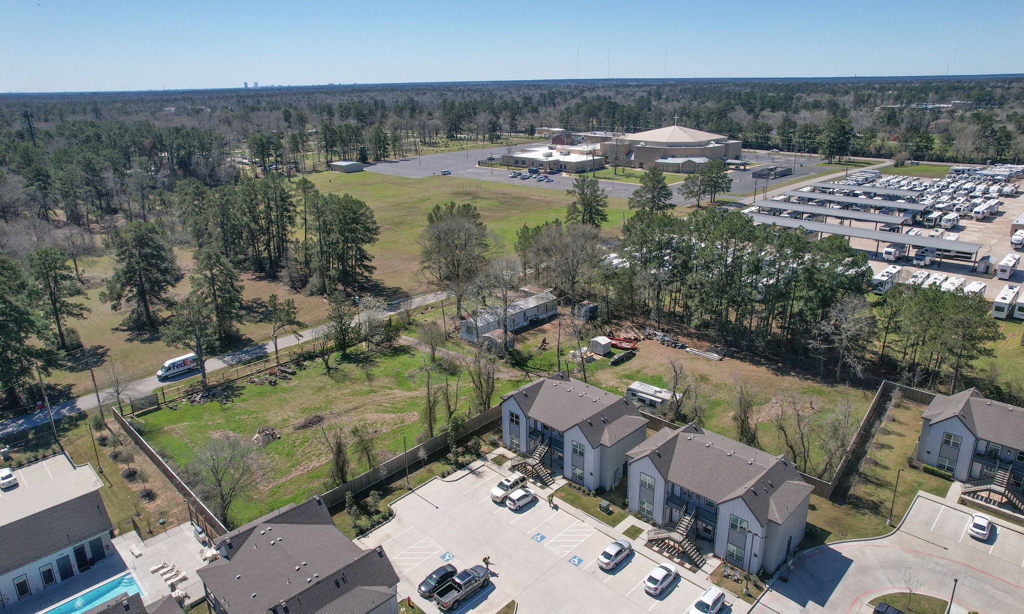 1929 Argo Road Conroe, TX 77301 - Photo 18 of 24 an aerial view of a house with a lake view