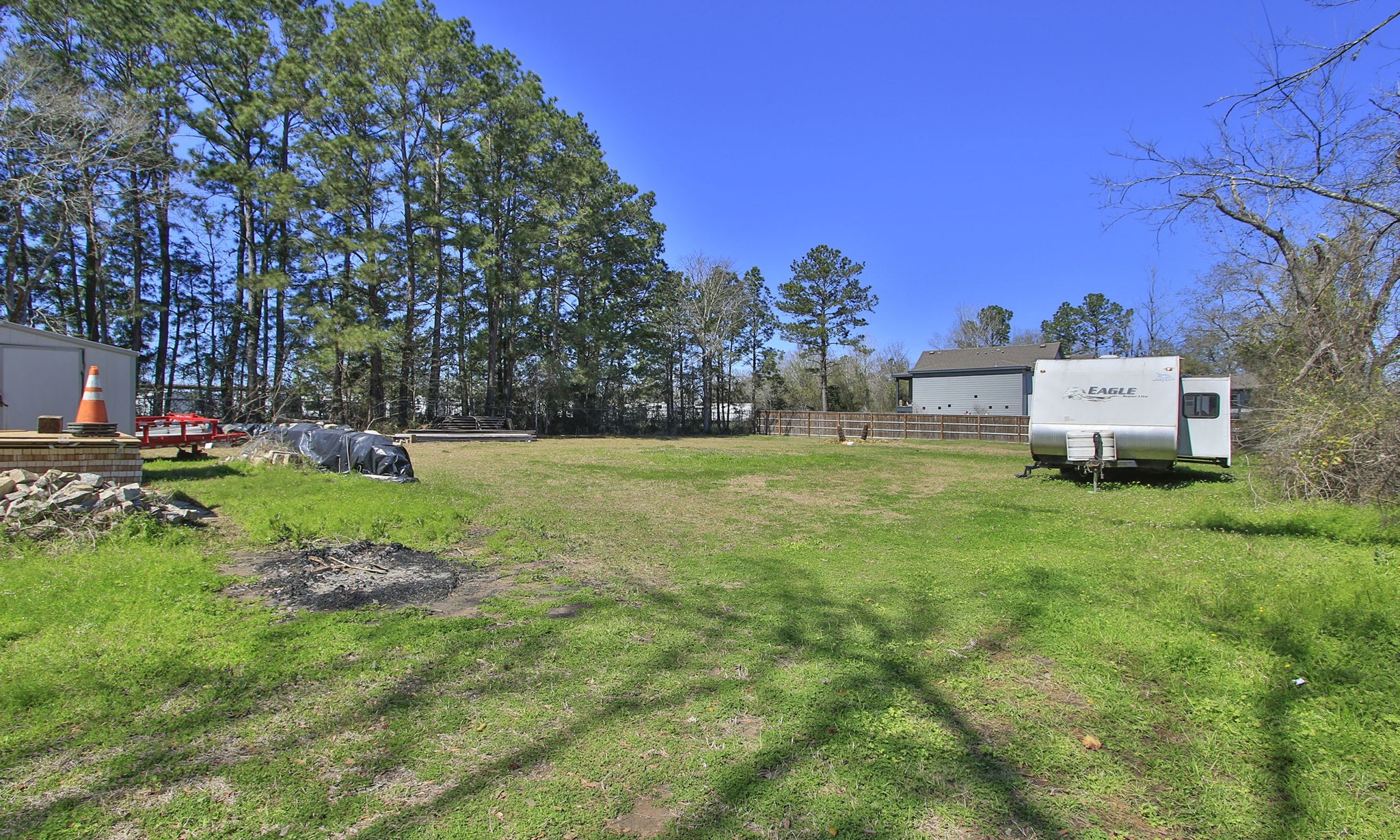 1929 Argo Road Conroe, TX 77301 - Photo 5 of 24 a view of a house with a yard