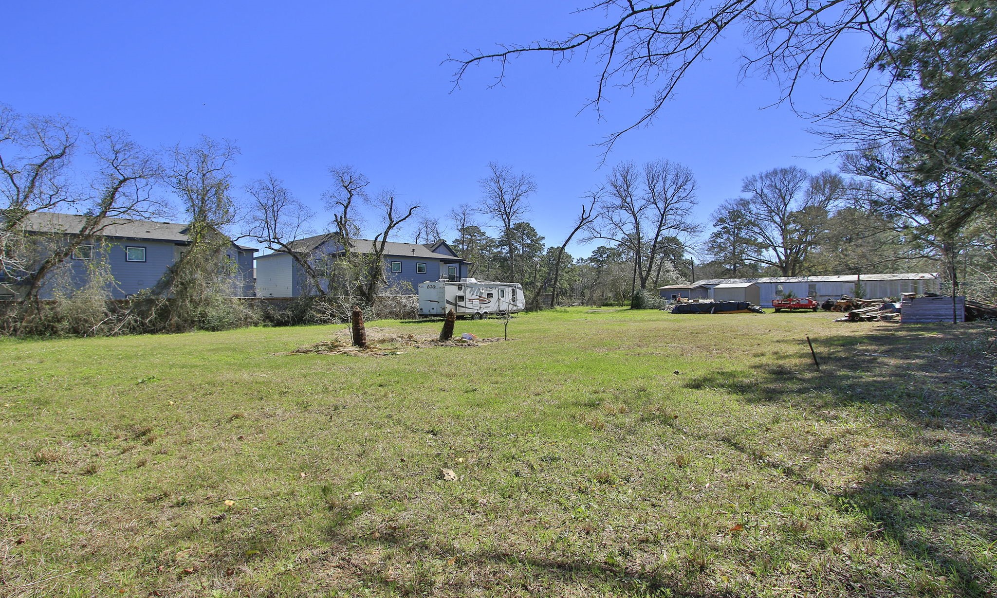 1929 Argo Road Conroe, TX 77301 - Photo 6 of 24 a view of a backyard with a house