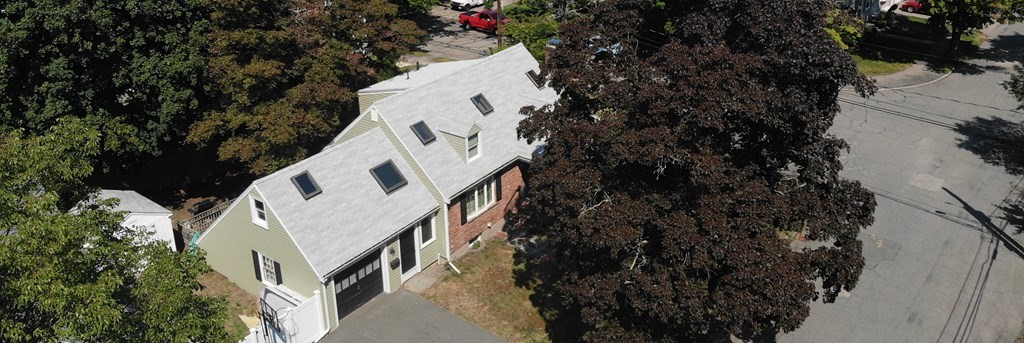 16 Coolidge Road Milton, MA 02186 - Photo 10 of 24 a view of a house with a yard