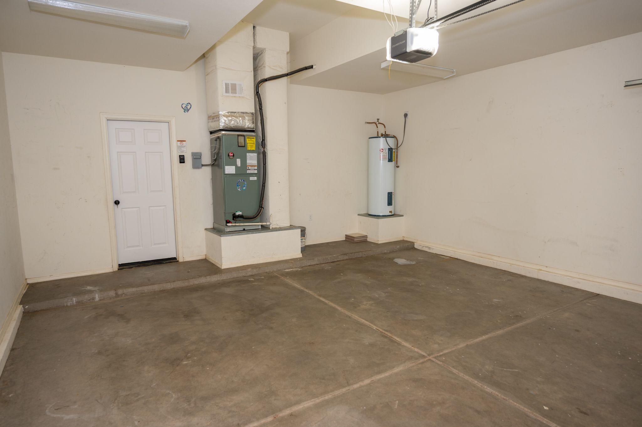 131 Alemania Court Rio Rico, AZ 85648 - Photo 39 of 47 an empty room with entrance and mirror